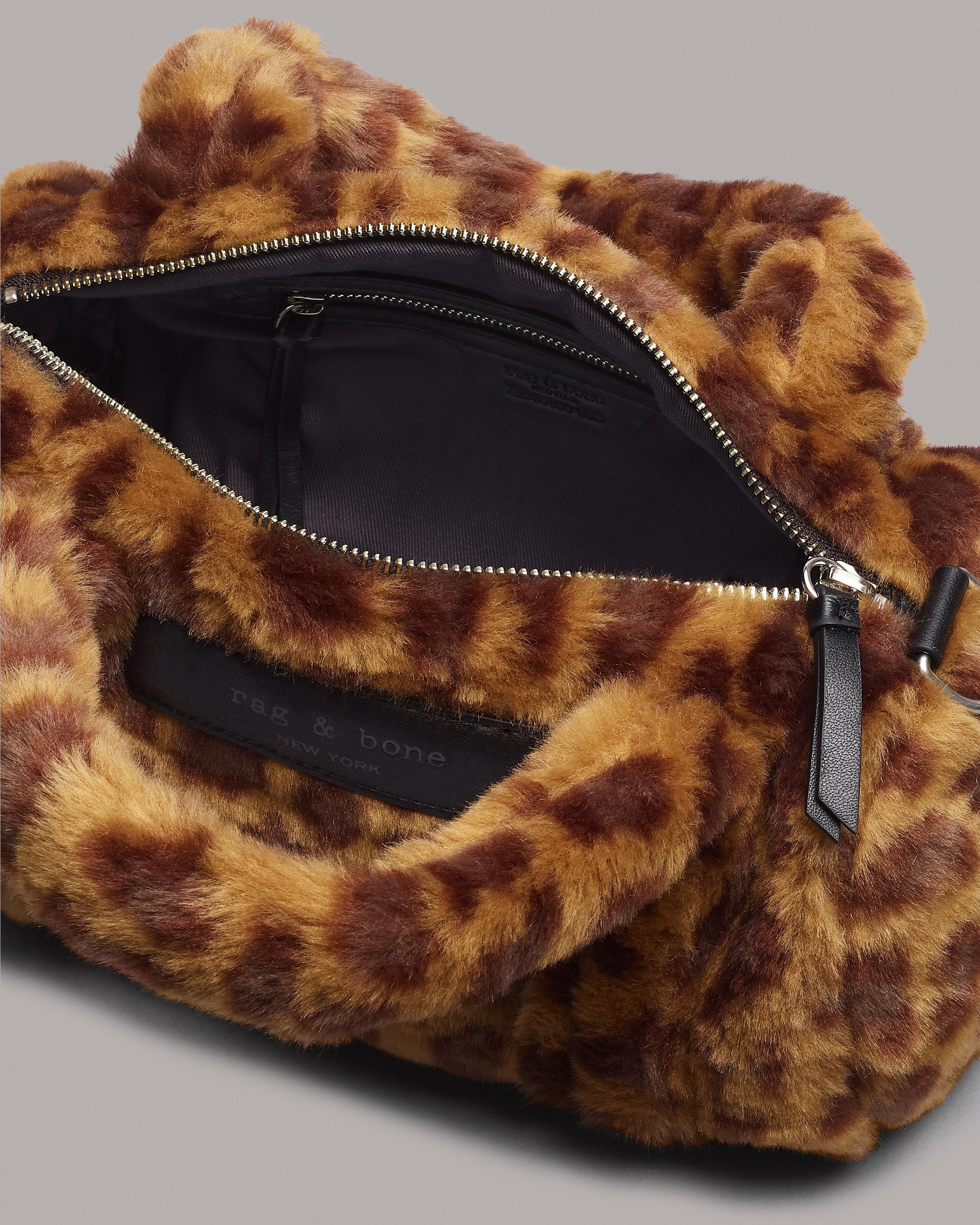 Cloud Duffle - Faux Fur
Mini Duffle Bag - 4