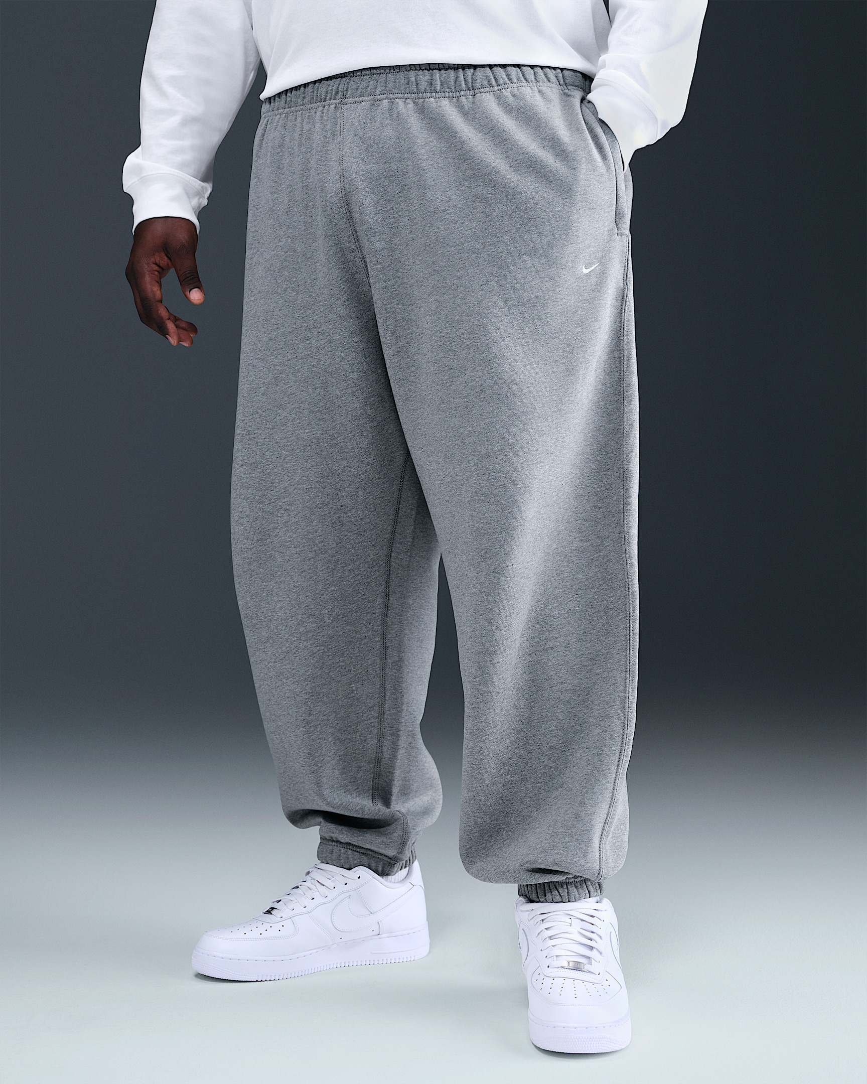 Nike Solo Swoosh Men's Cuffed Fleece Pants - 7