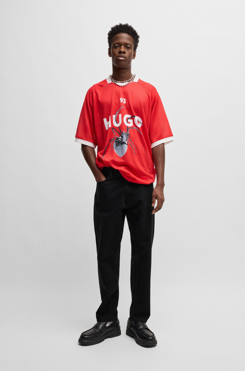 HUGO TAPERED-FIT JEANS IN BLACK DENIM outlook