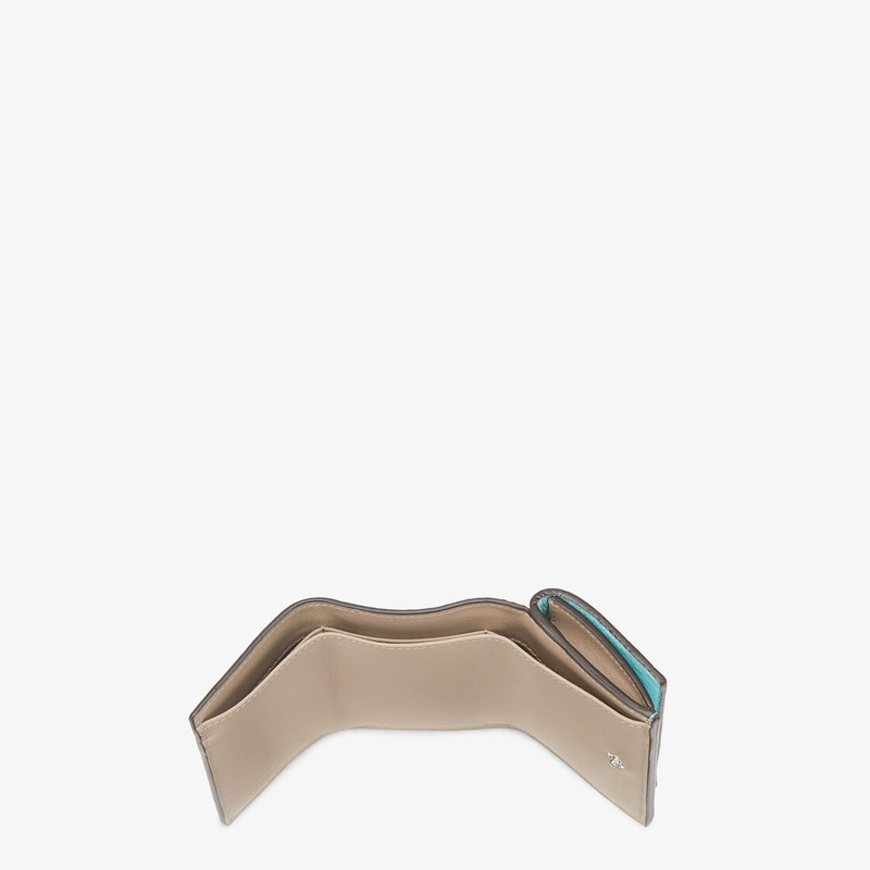 Compact, tri-fold Peekaboo wallet with large internal bill compartment and three concealed card hold 4