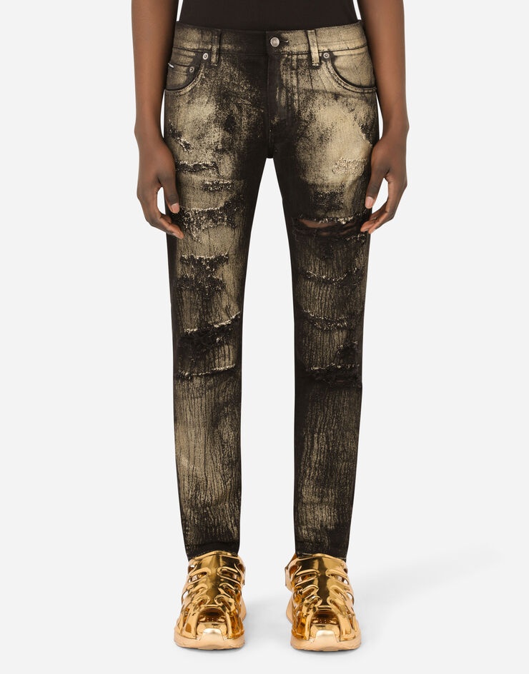 Slim-fit black stretch jeans with gold spray and rips - 1