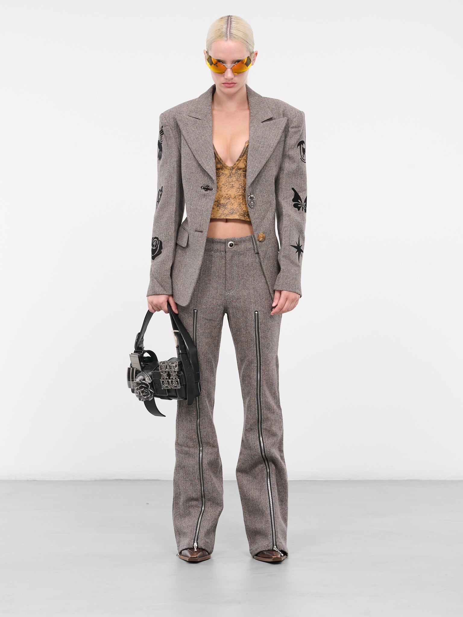 パンツ [Anderson Bell] AIKA HERRINGBONE ZIP-UP BELL TROUSER Andersson Bell - AIKA HERRINGBONE ZIP-UP BELL PANTS | HBX