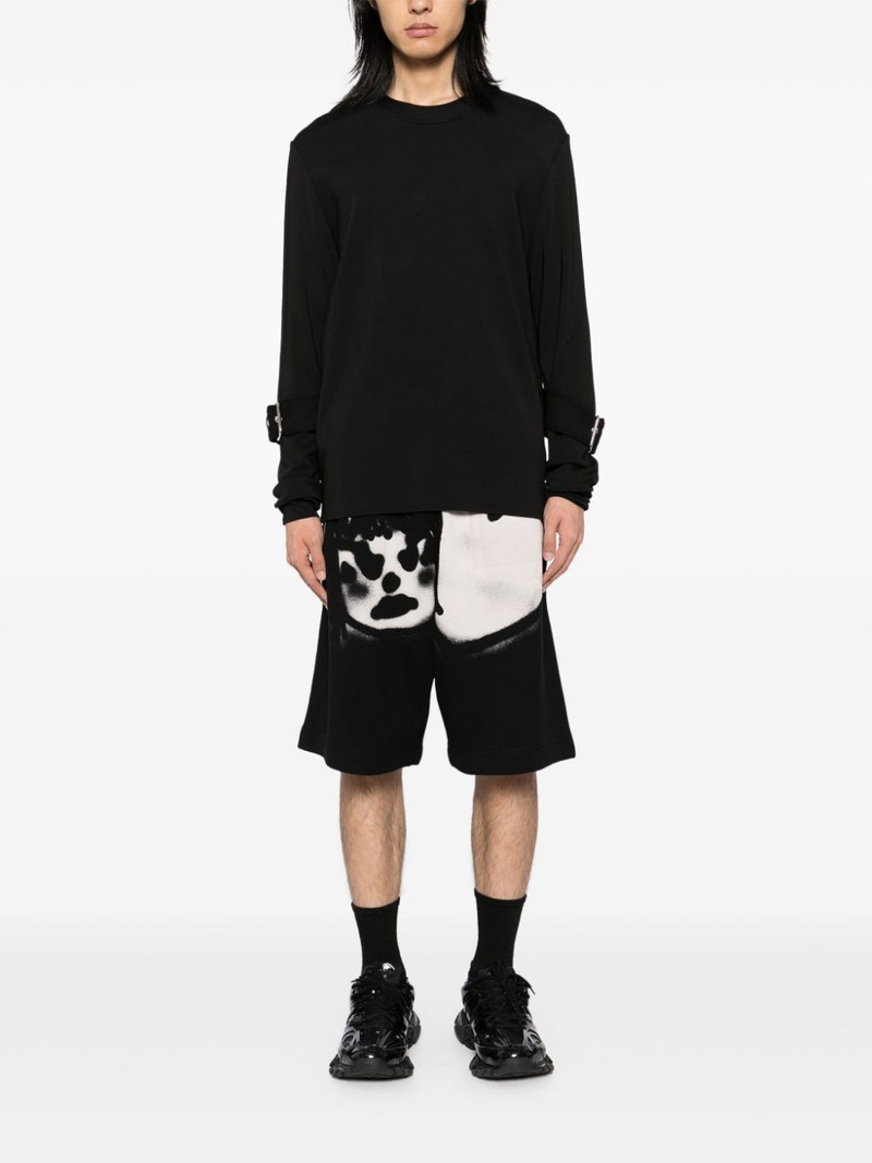 Givenchy graffiti print shorts outlook