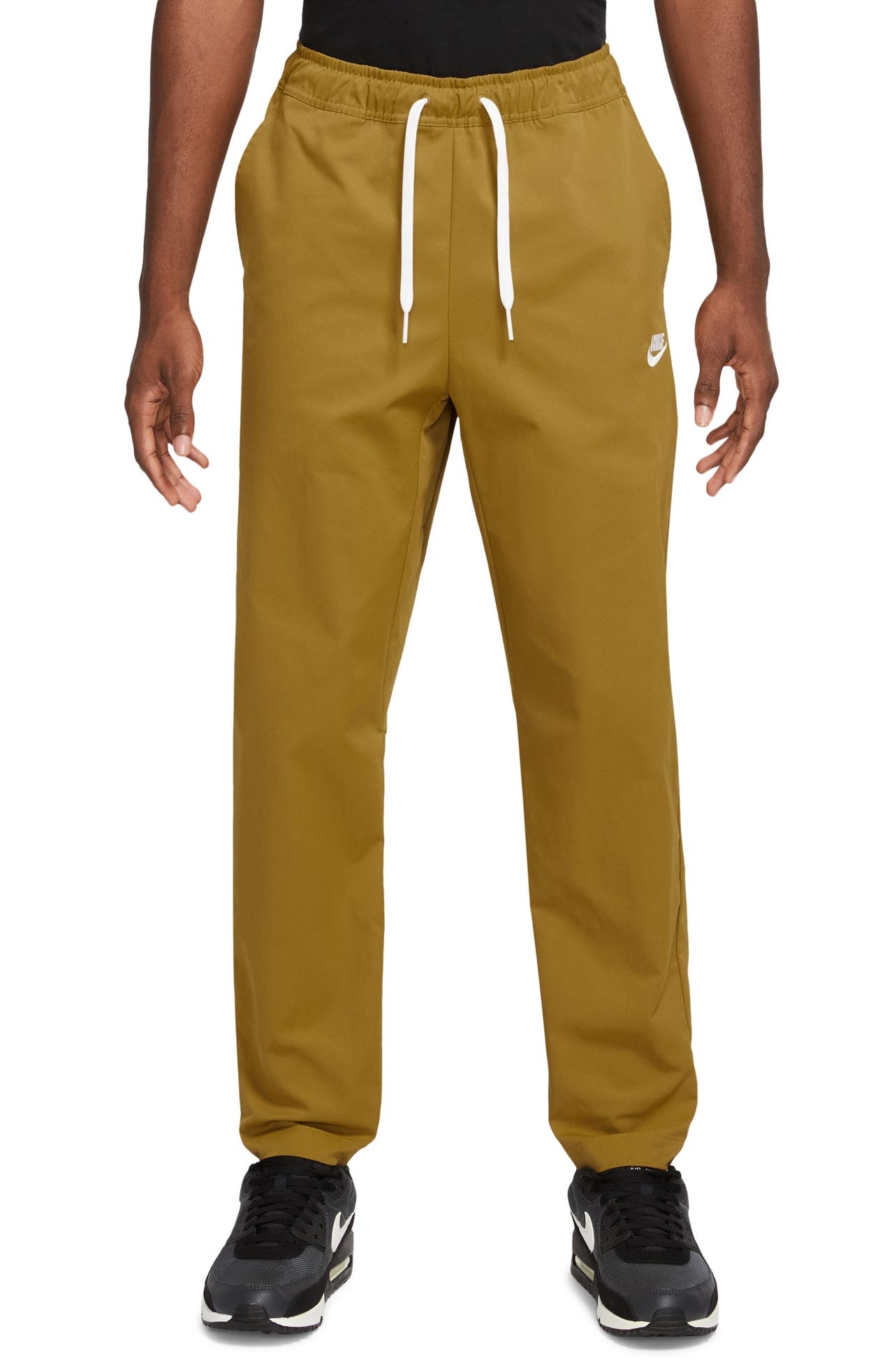 Nike Woven Tapered Leg Pants in Bronze/White at Nordstrom - 1