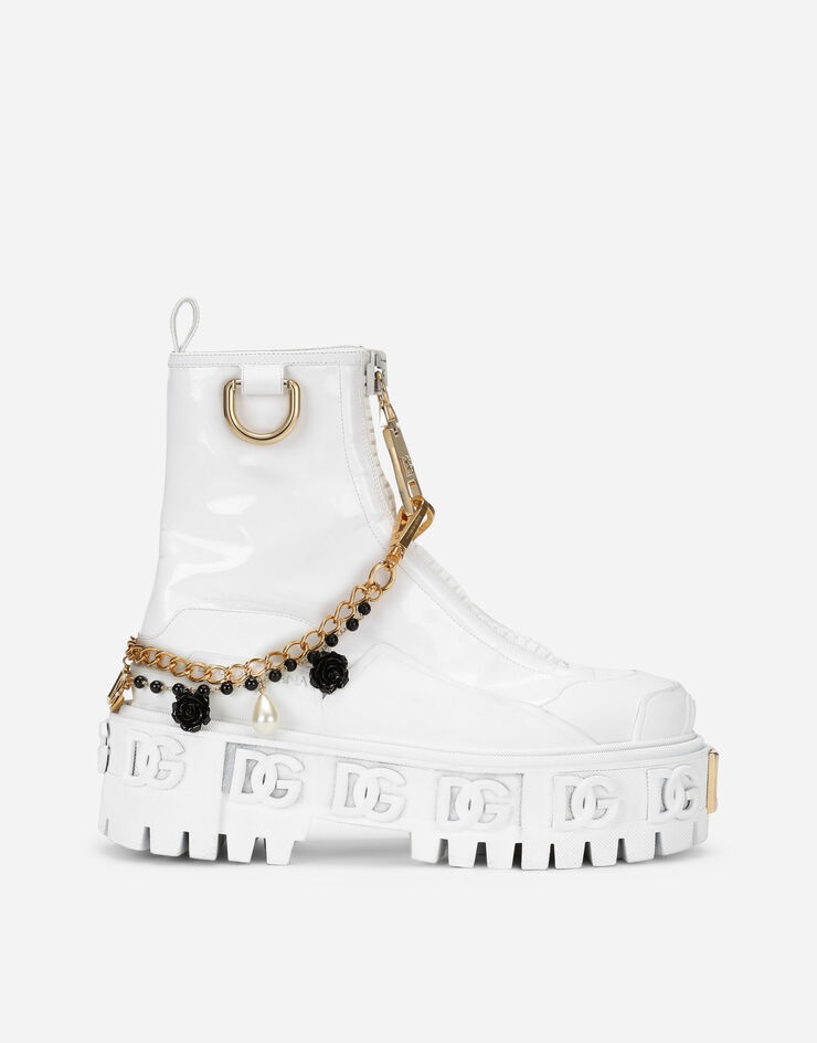 Rubberized calfskin and patent leather ankle boots with bejeweled chain and DG logo - 1