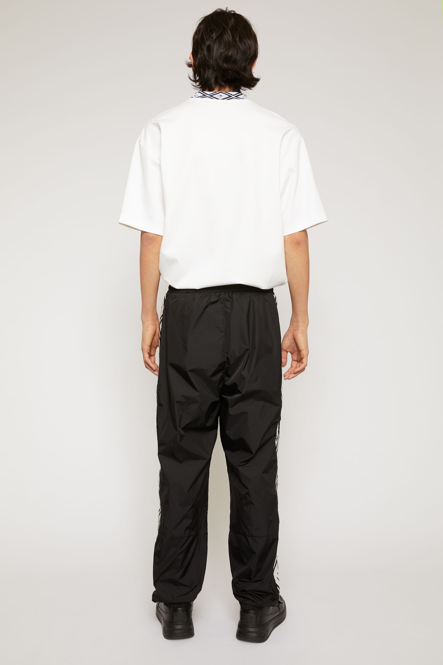 Face motif stripe track pants black - 5