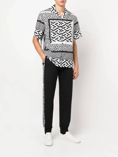 VERSACE La Greca striped track pants outlook