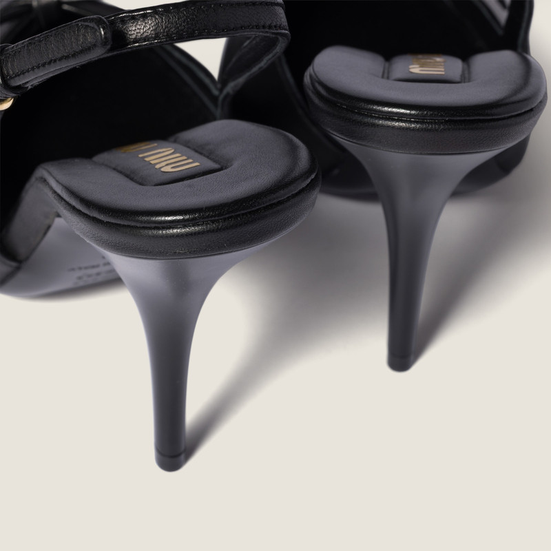 Miu Miu Leather slingback pumps with bow outlook