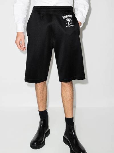 Moschino logo-tape cotton track shorts outlook