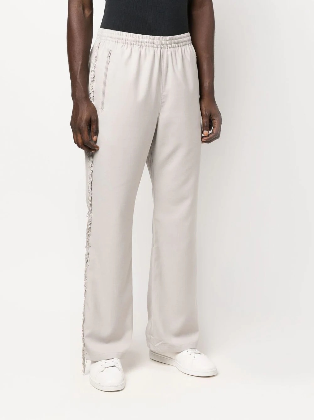 logo-embroidered tasseled trousers - 6