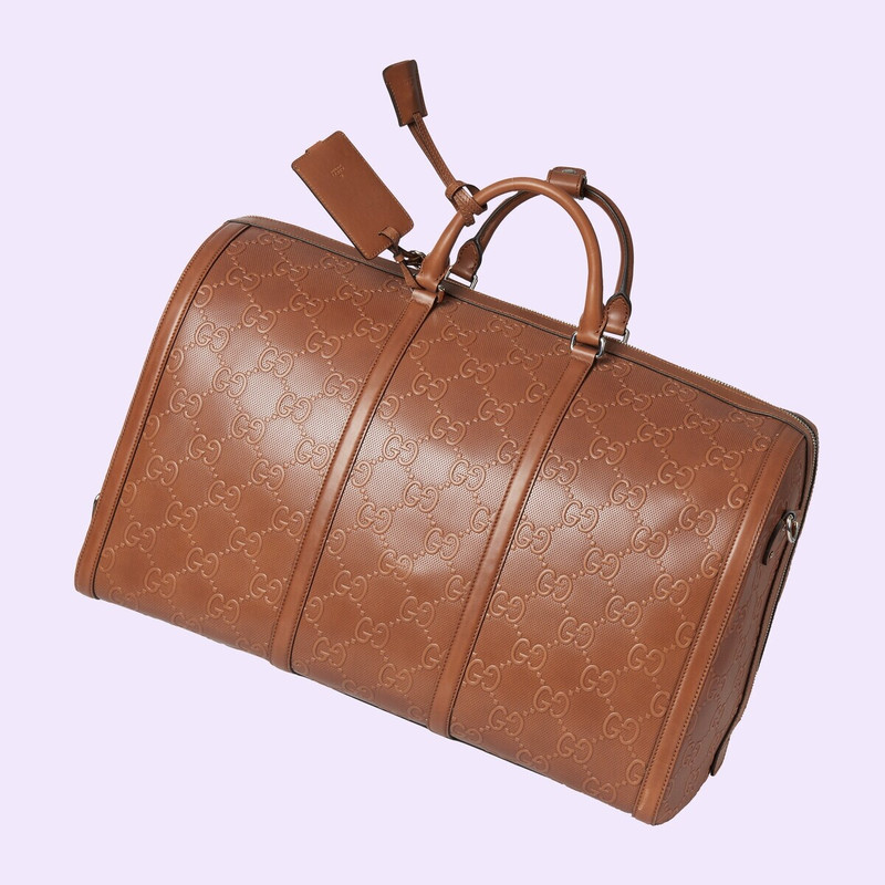 GG embossed large duffle bag 4
