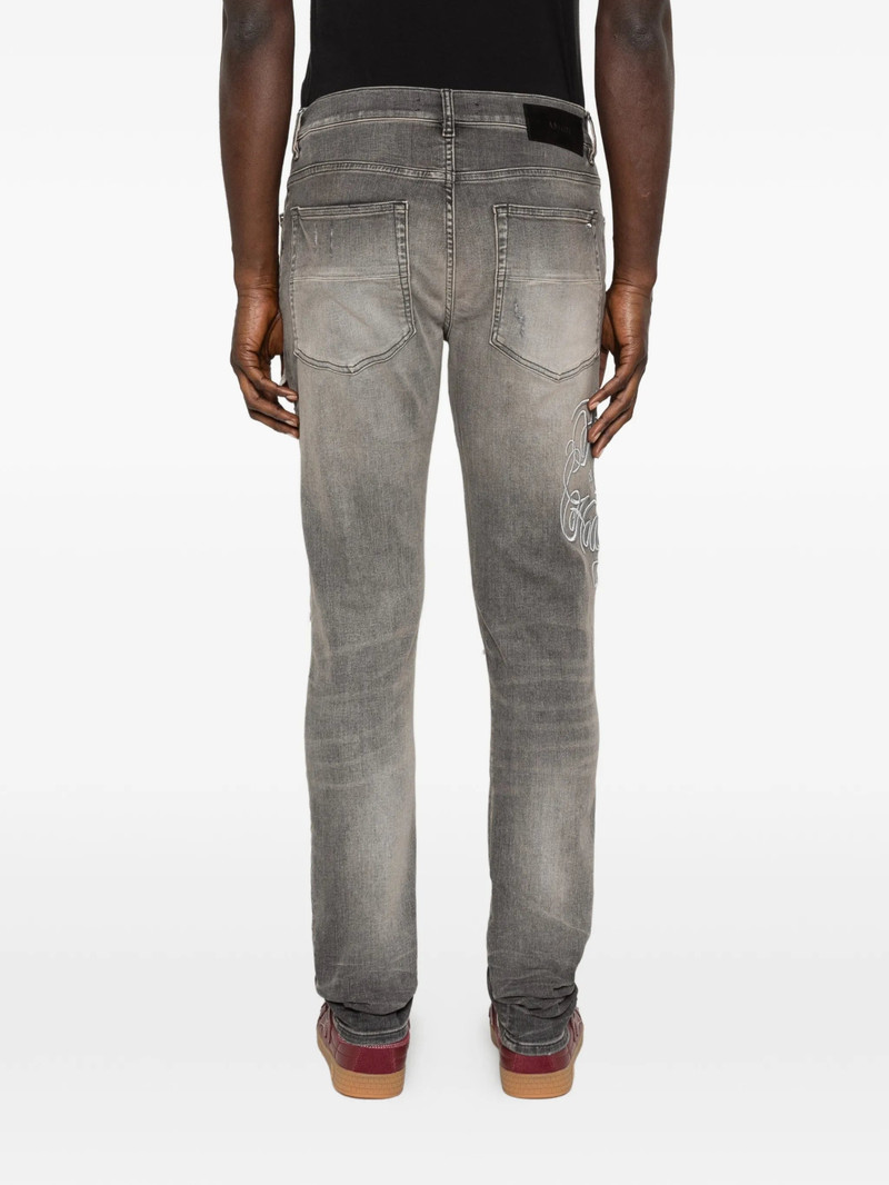 AMIRI Amiri Ripped Embroidery Jeans outlook