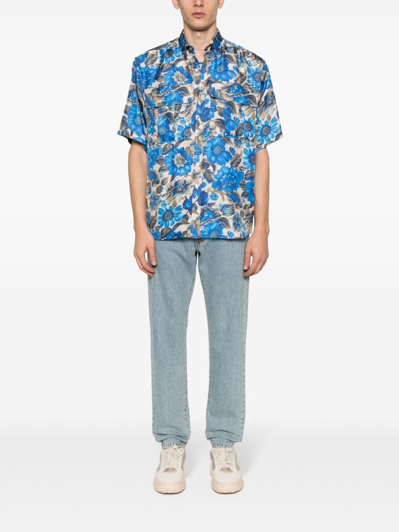 Moschino logo-appliquÃ© straight-leg jeans outlook