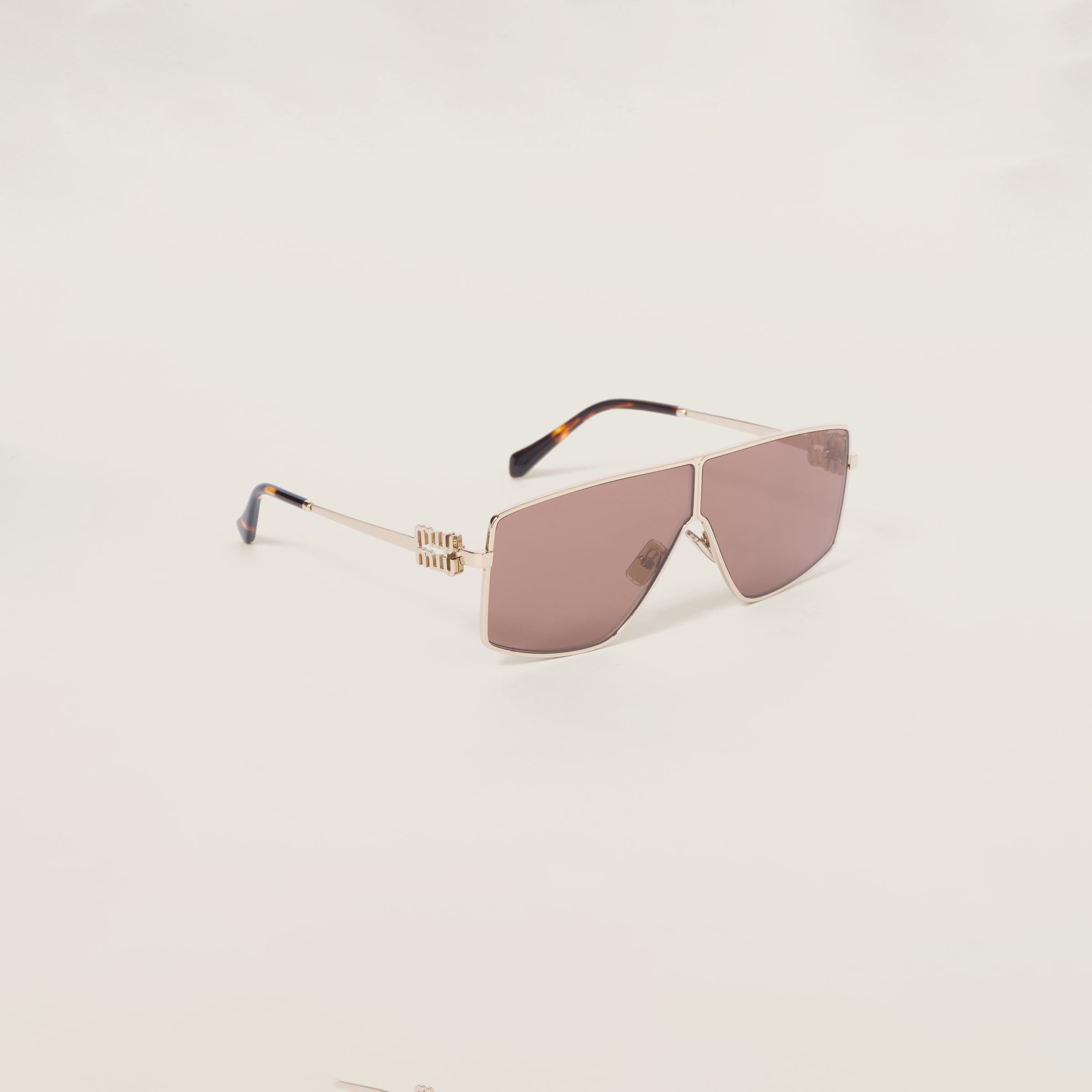 Miu Miu Miu Miu Logo sunglasses | REVERSIBLE
