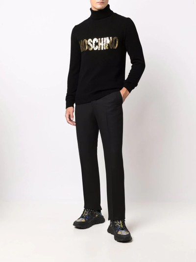 Moschino painted-logo cashmere jumper outlook