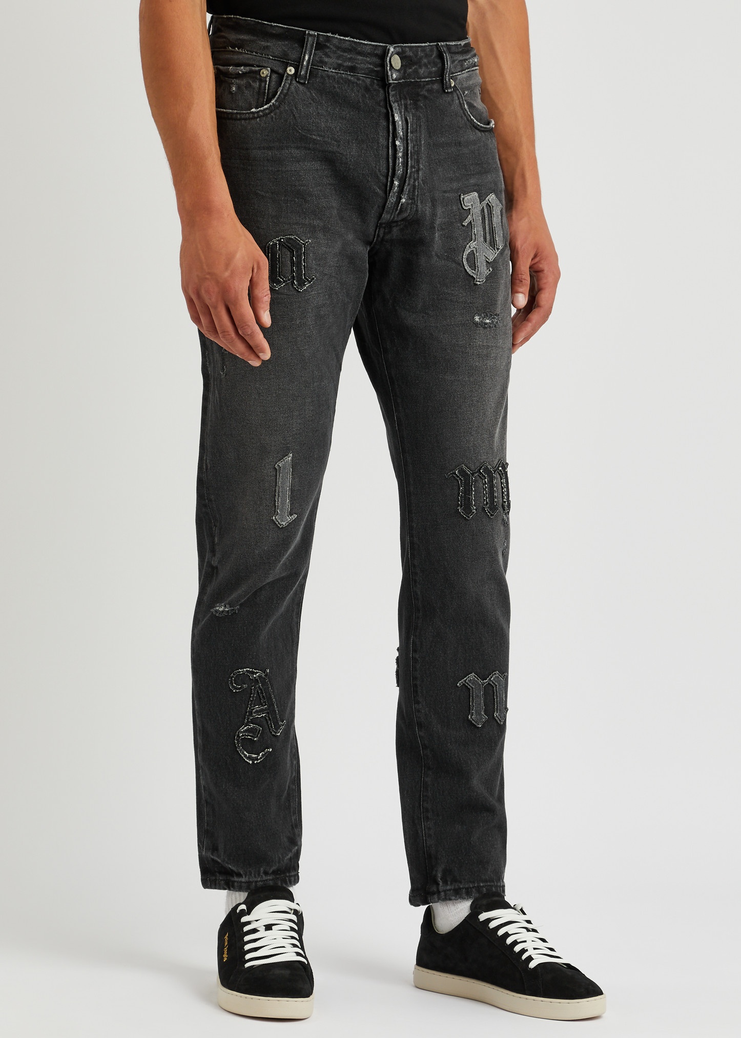 Logo-appliquéd distressed slim-leg jeans - 2