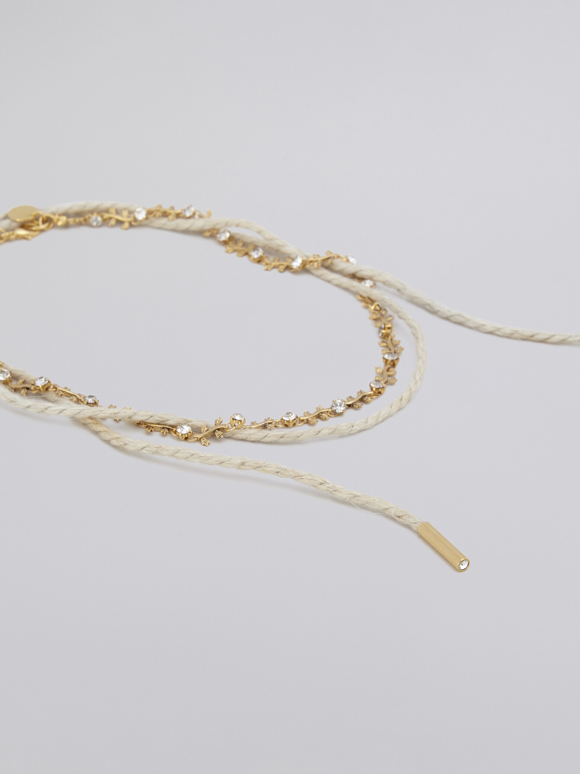 SET OF TWO FOUND BRASS NECKLACES - 3