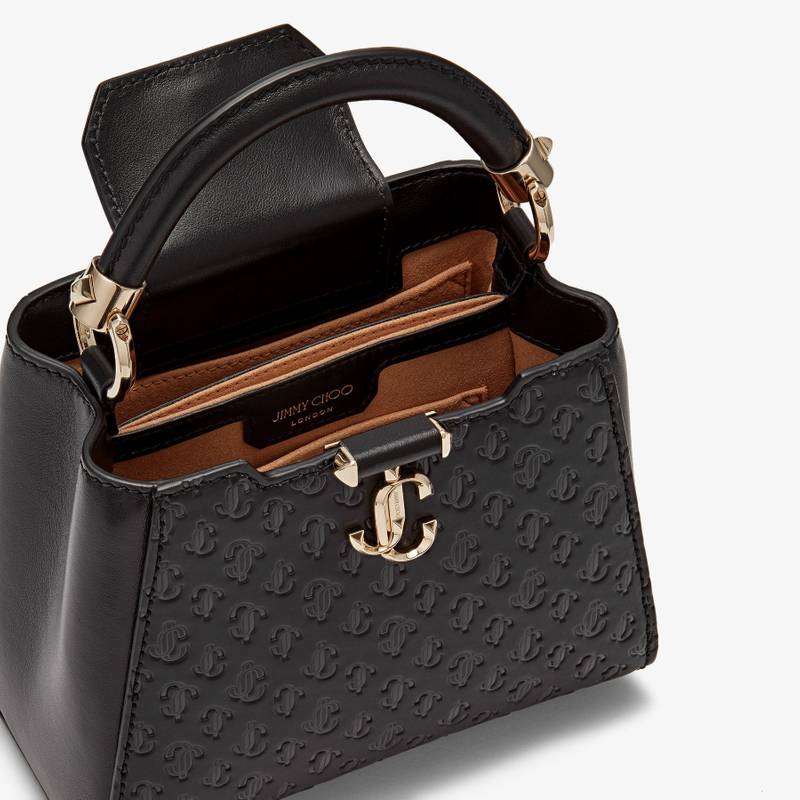 Varenne Top Handle Mini
Black JC Monogram-Print and Leather Top Handle Bag 3