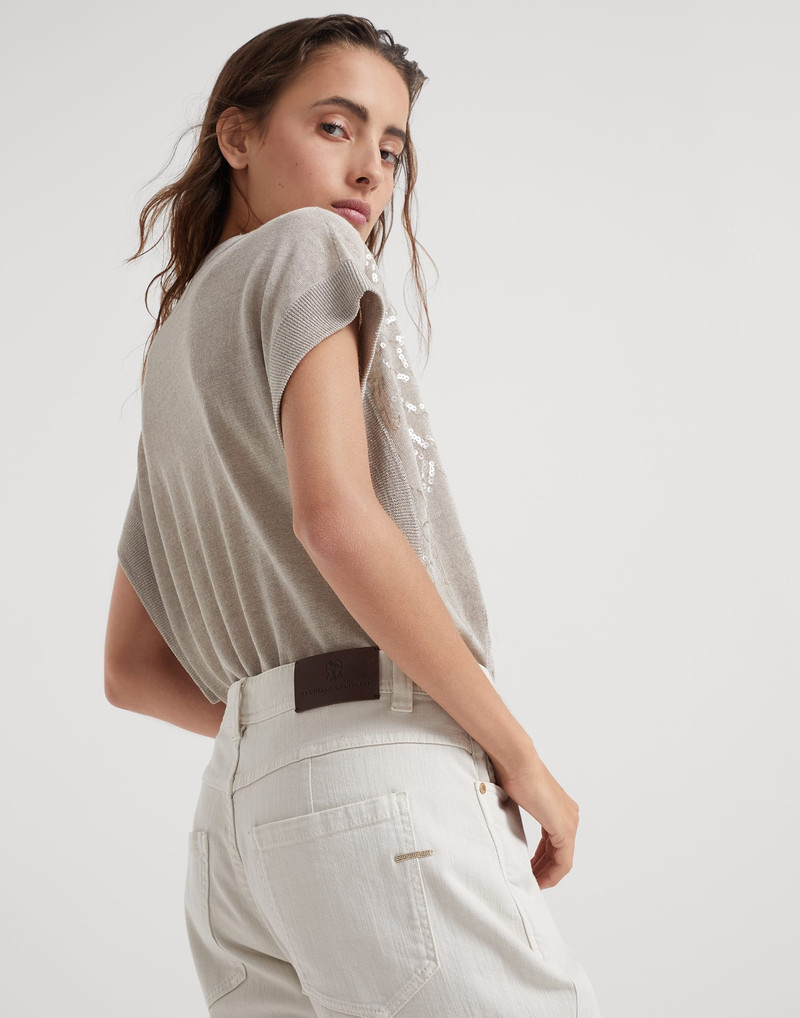 Stretch dyed denim slim tapered trousers with monili 4
