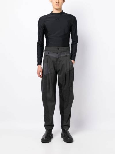 FENG CHEN WANG layered-design tapered trousers outlook