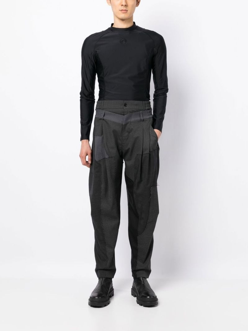 FENG CHEN WANG layered-design tapered trousers outlook
