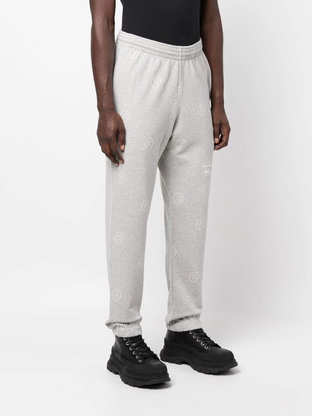 all-over logo-print track pants - 4