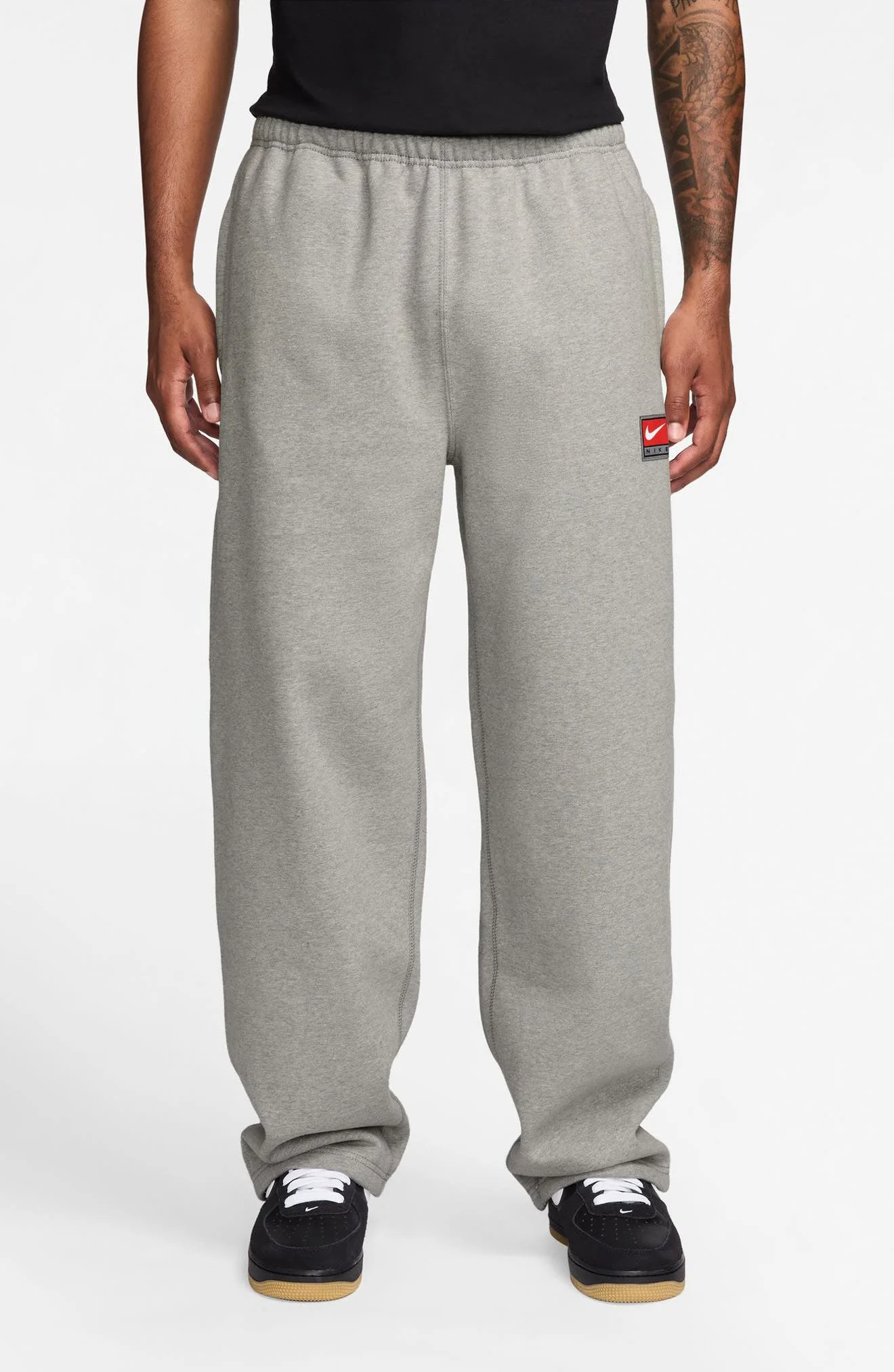 Nike Solo Fleece Pants in Dark Grey Heather/White at Nordstrom - 1