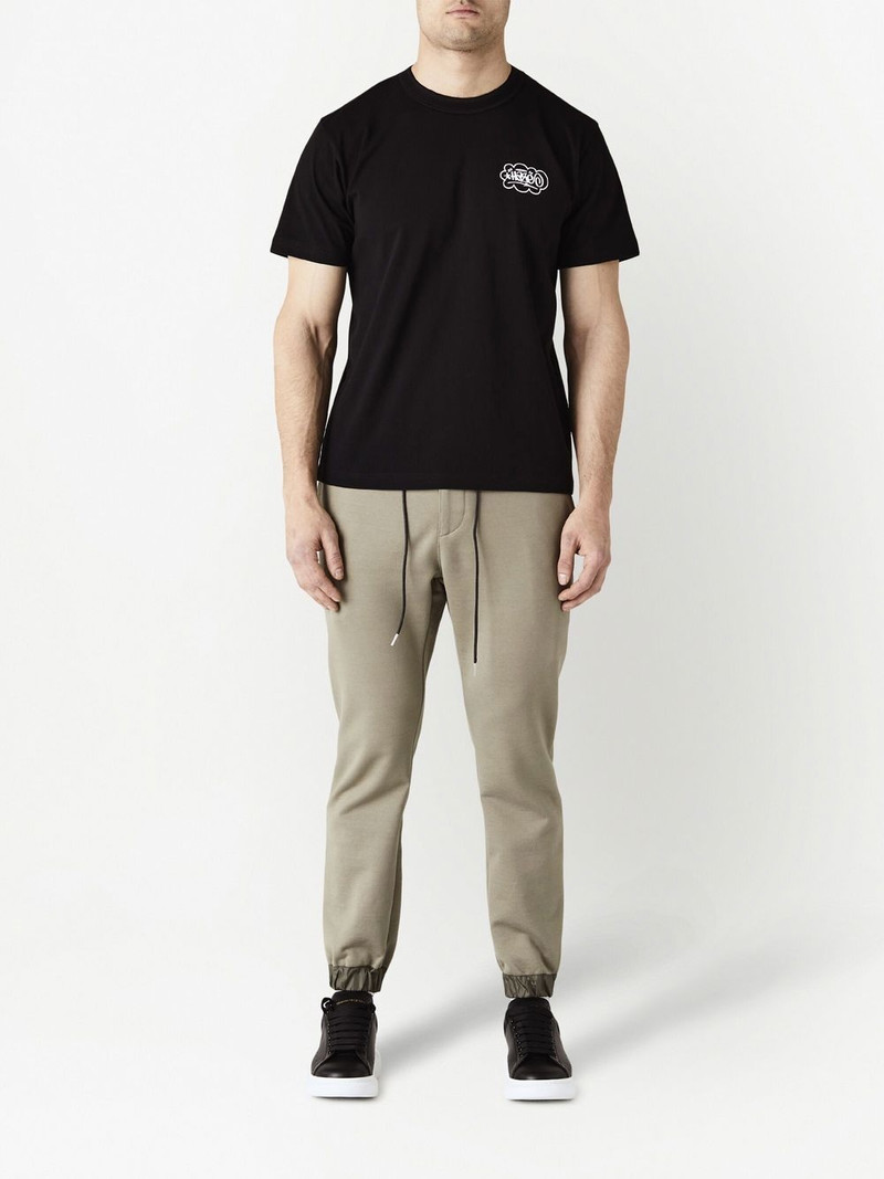 sacai x Eric Haze Onekindword-print T-shirt outlook