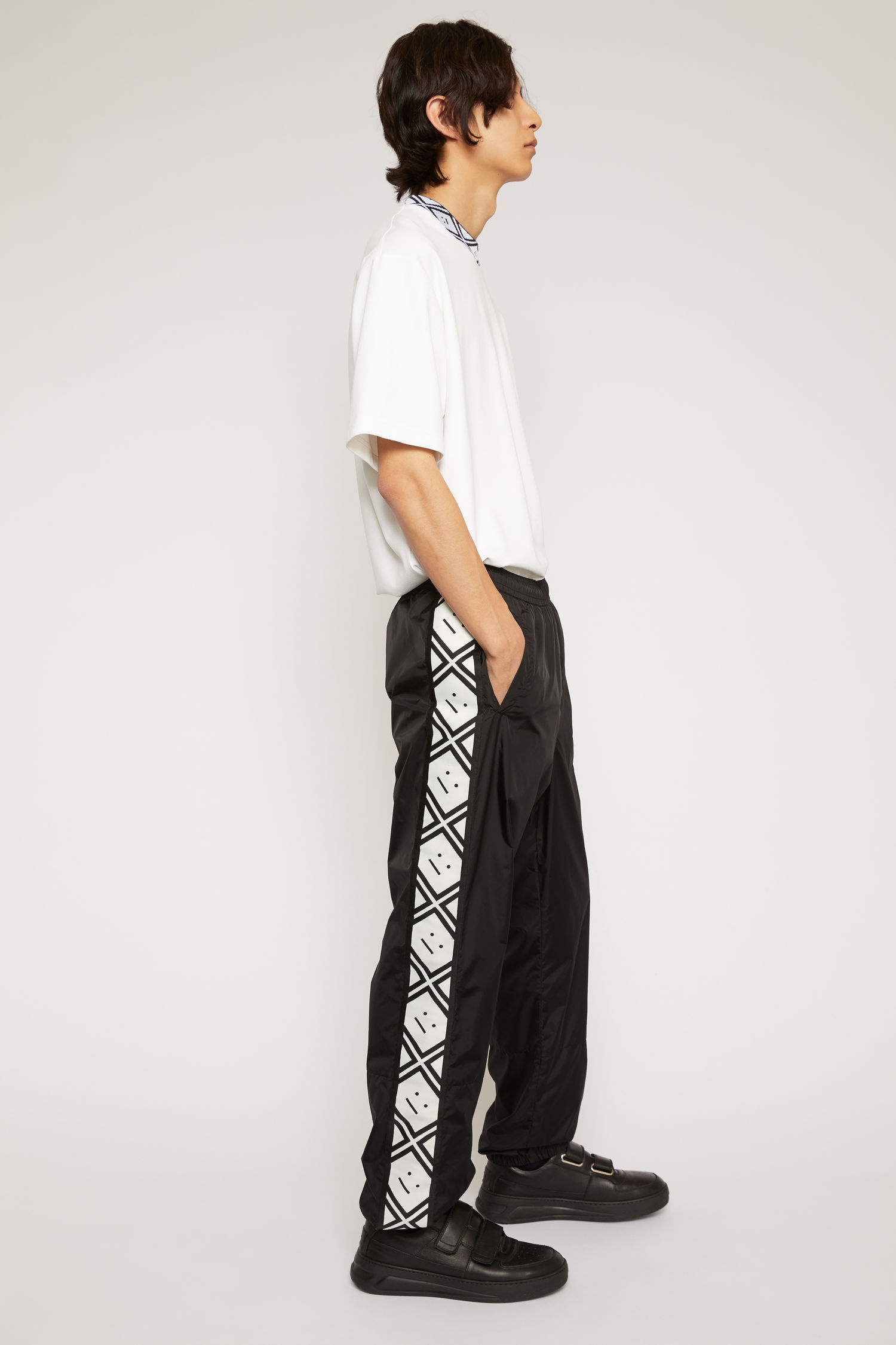 Face motif stripe track pants black - 3