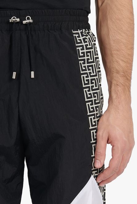 Black and white nylon sweatpants with Balmain monogram - 8