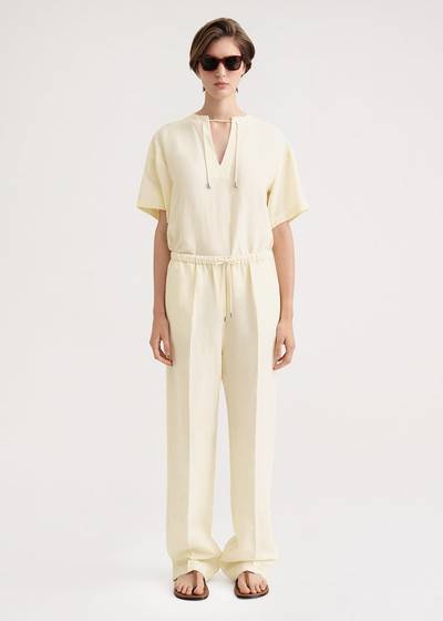 Totême Press-creased drawstring trousers vanilla outlook