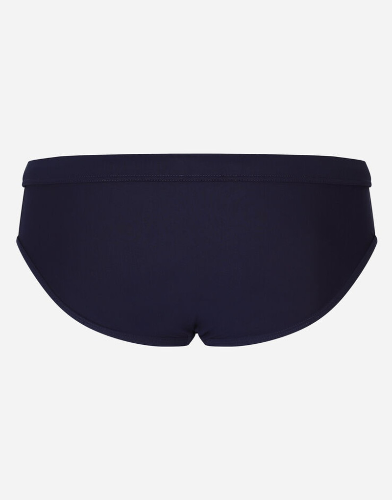 Dolce & Gabbana Swim briefs with high-cut leg and branded plate outlook