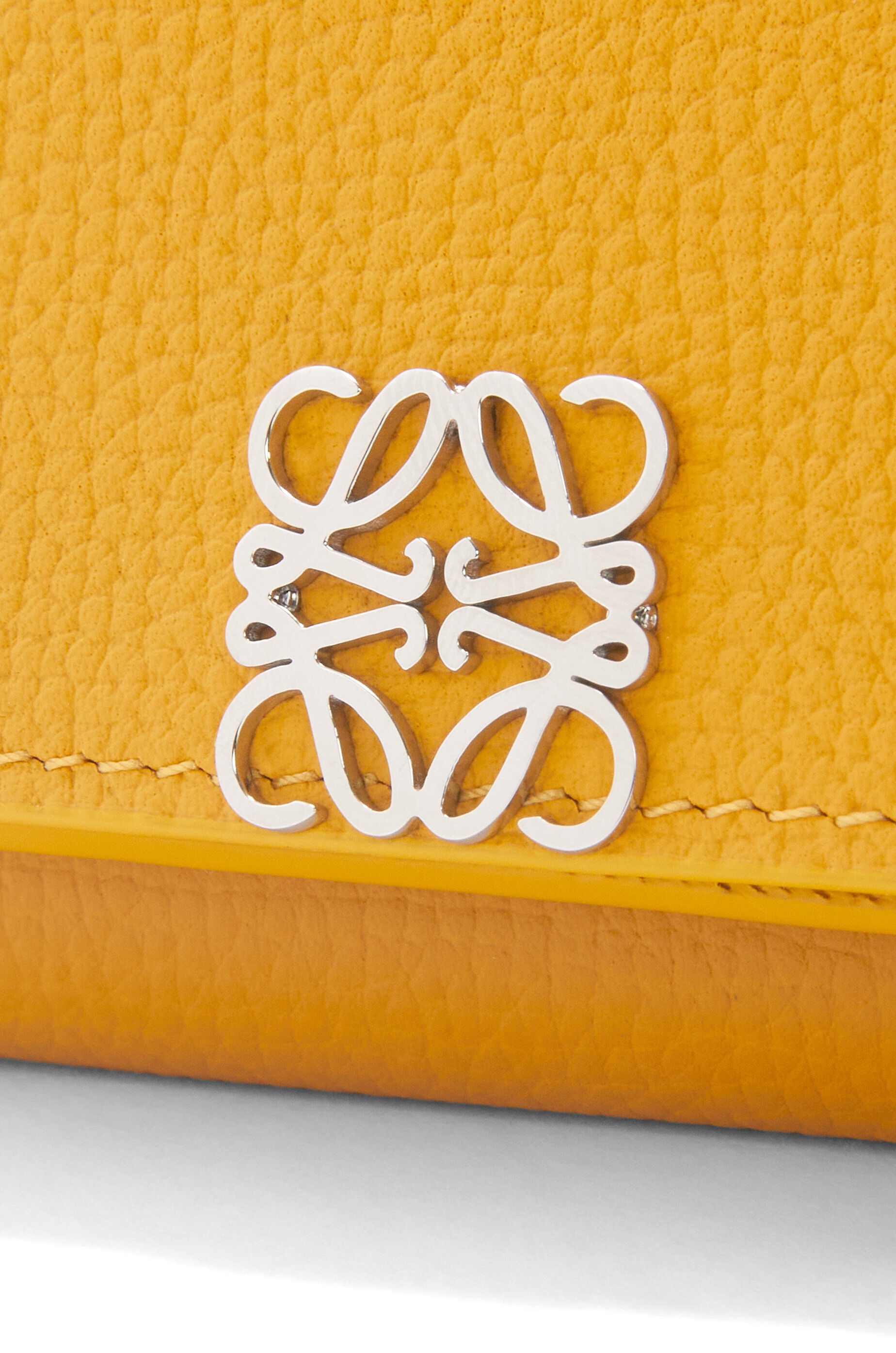Anagram trifold wallet in pebble grain calfskin 6