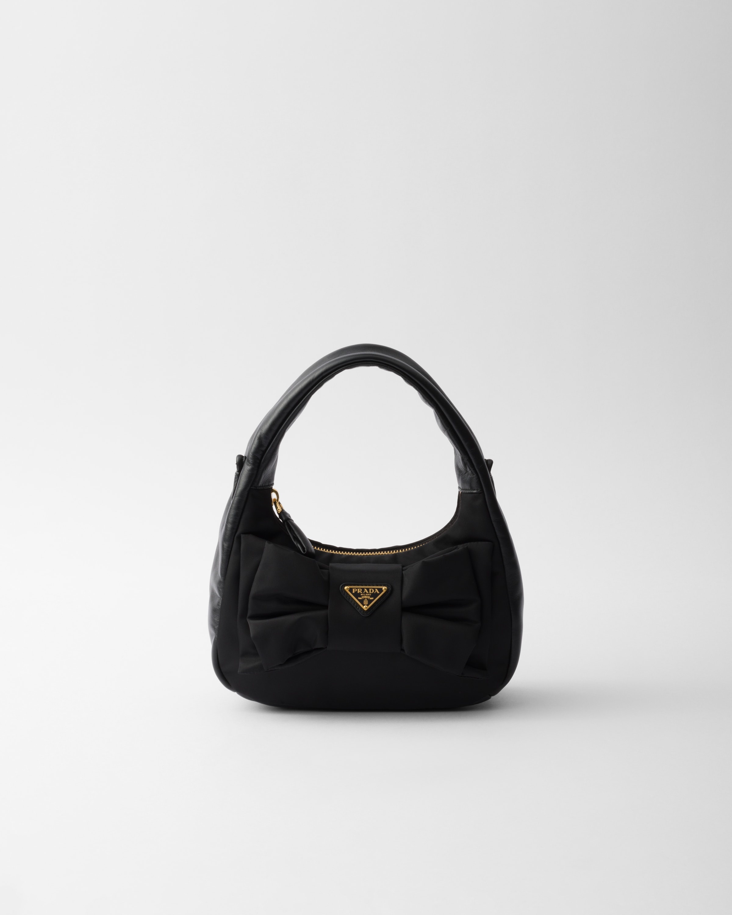 Re-Nylon and nappa leather mini-bag with bow - 1