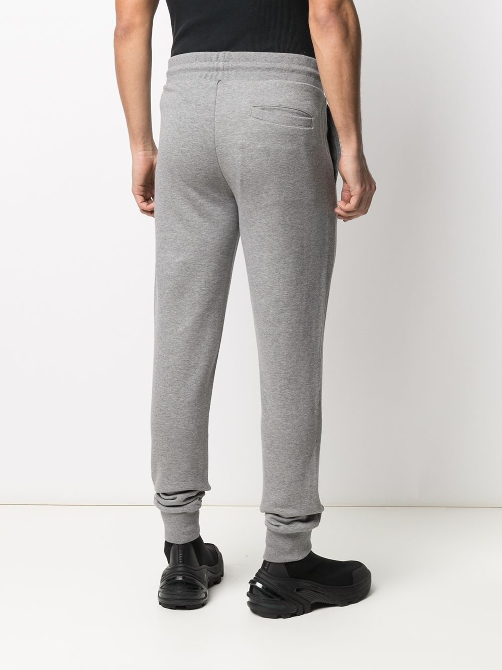 logo-embossed track pants - 4