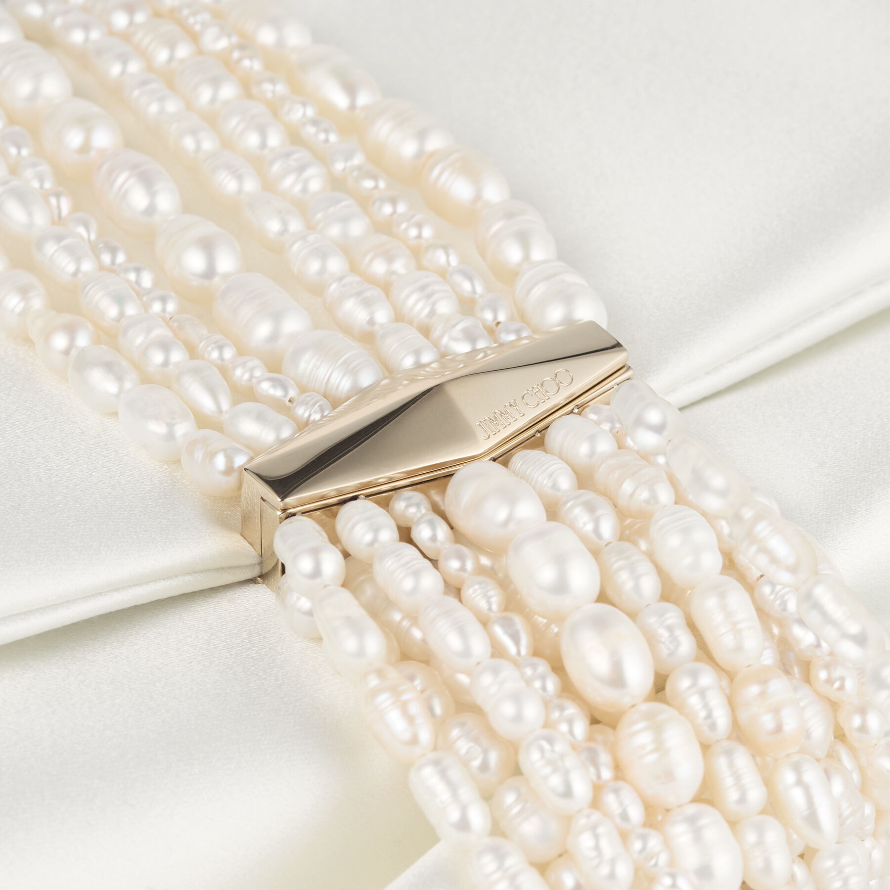 Zandra
Ivory Satin Clutch Bag - 3