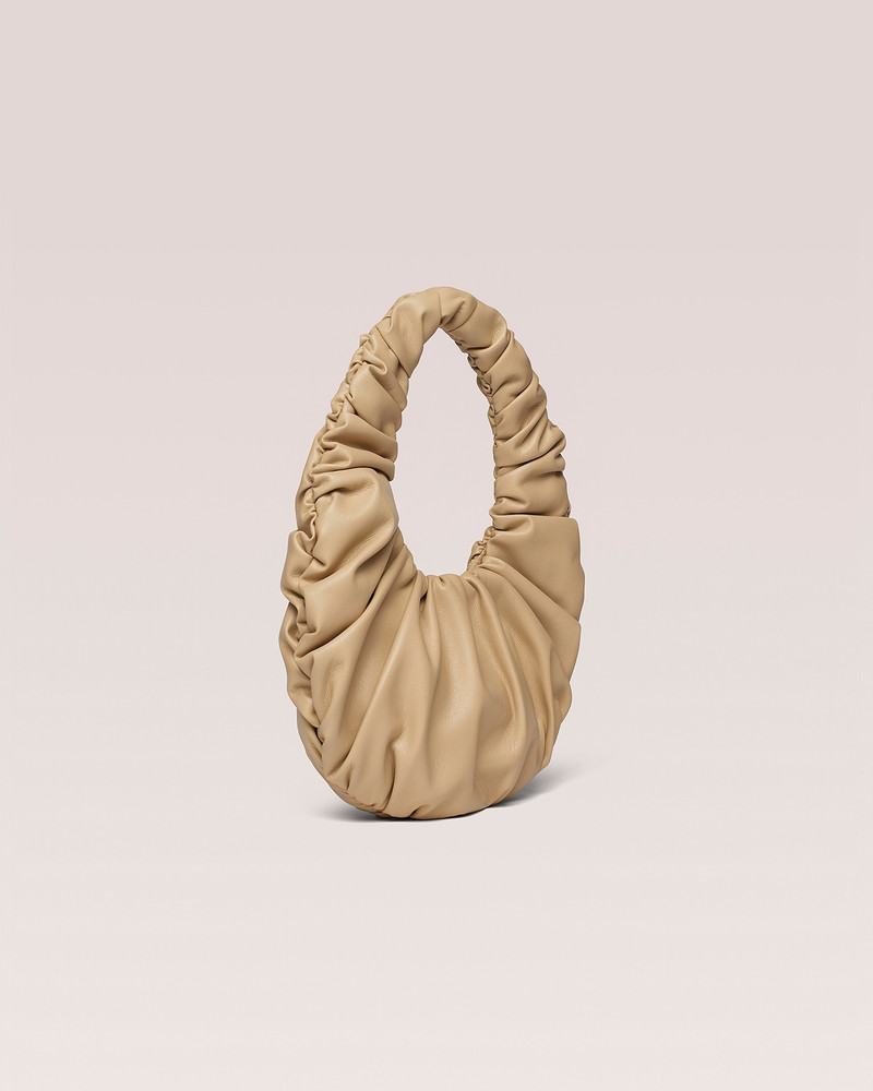Nanushka ANJA BAGUETTE MINI - OKOBOR™ alt-leather ruched bag - Almond outlook