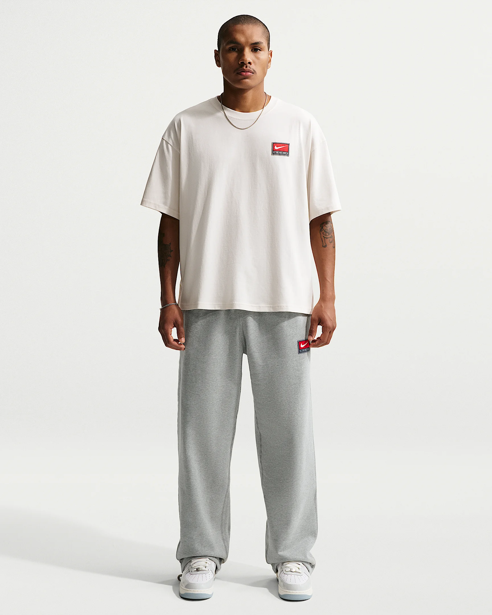 Nike Solo Swoosh Men's Fleece Open-Hem Pants - 1