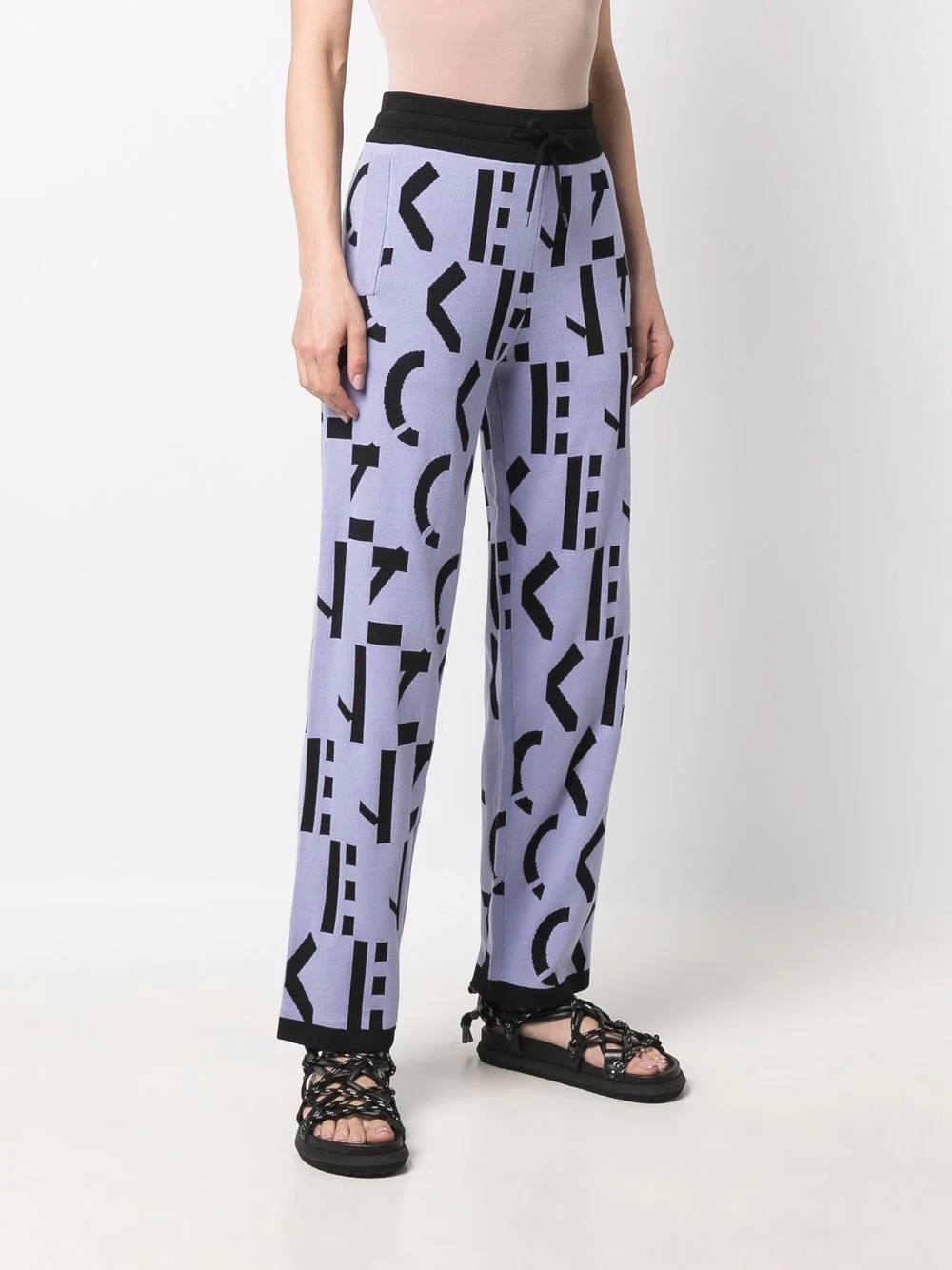 all-over logo-print trousers - 3