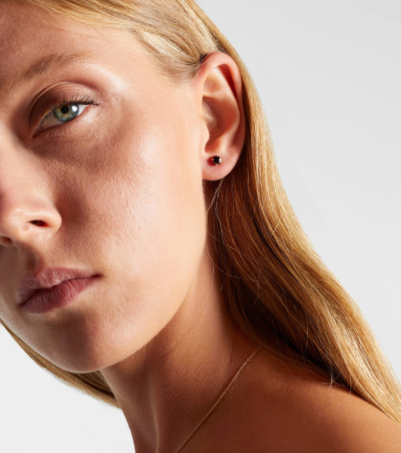 STONE AND STRAND 10kt gold earrings with garnet outlook