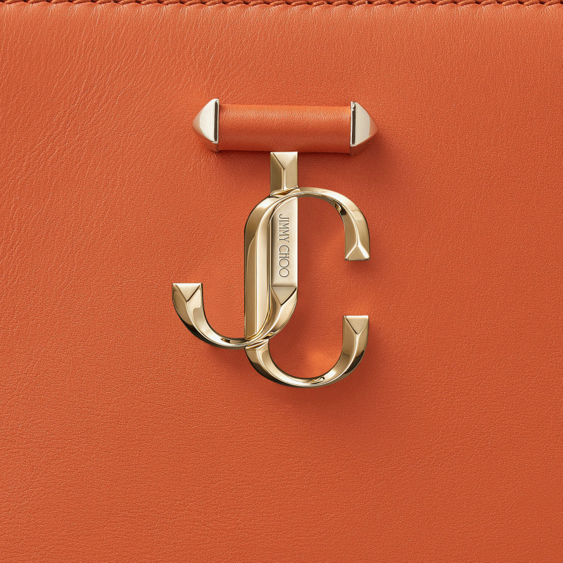 Varenne Tote Bag
Dark Amber Orange Fine Shiny Calf Leather Tote Bag with Light Gold JC Emblem 7