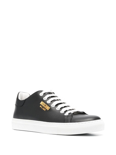 Moschino logo-lettering low-top sneakers outlook