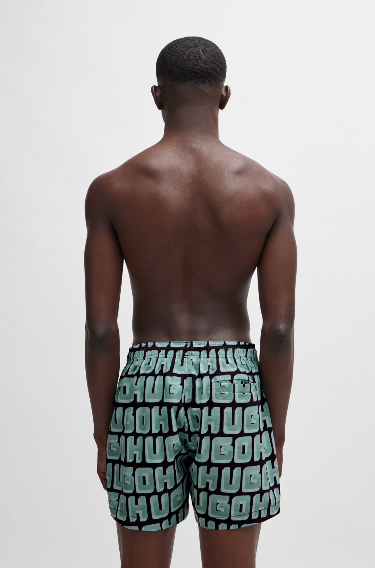 QUICK-DRY SWIM SHORTS WITH ALL-OVER LOGO PRINT - 4