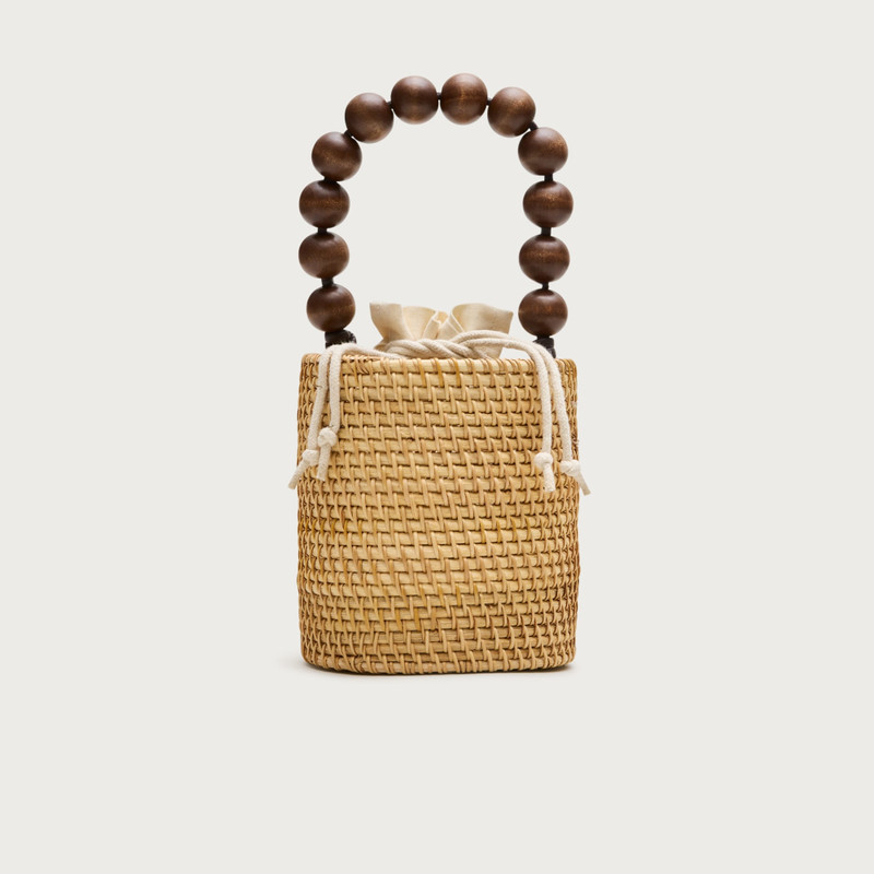 Handknotted rattan bucket bag with wood beads 1