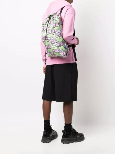 Comme des Garçons SHIRT Kaws-print backpack outlook