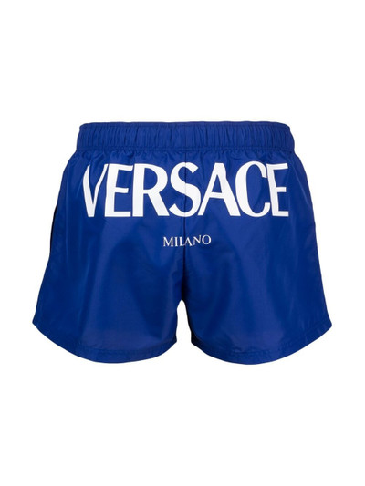 VERSACE logo-print swim shorts outlook