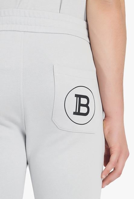 Light gray eco-designed sweatpants with black Balmain logo print - 8