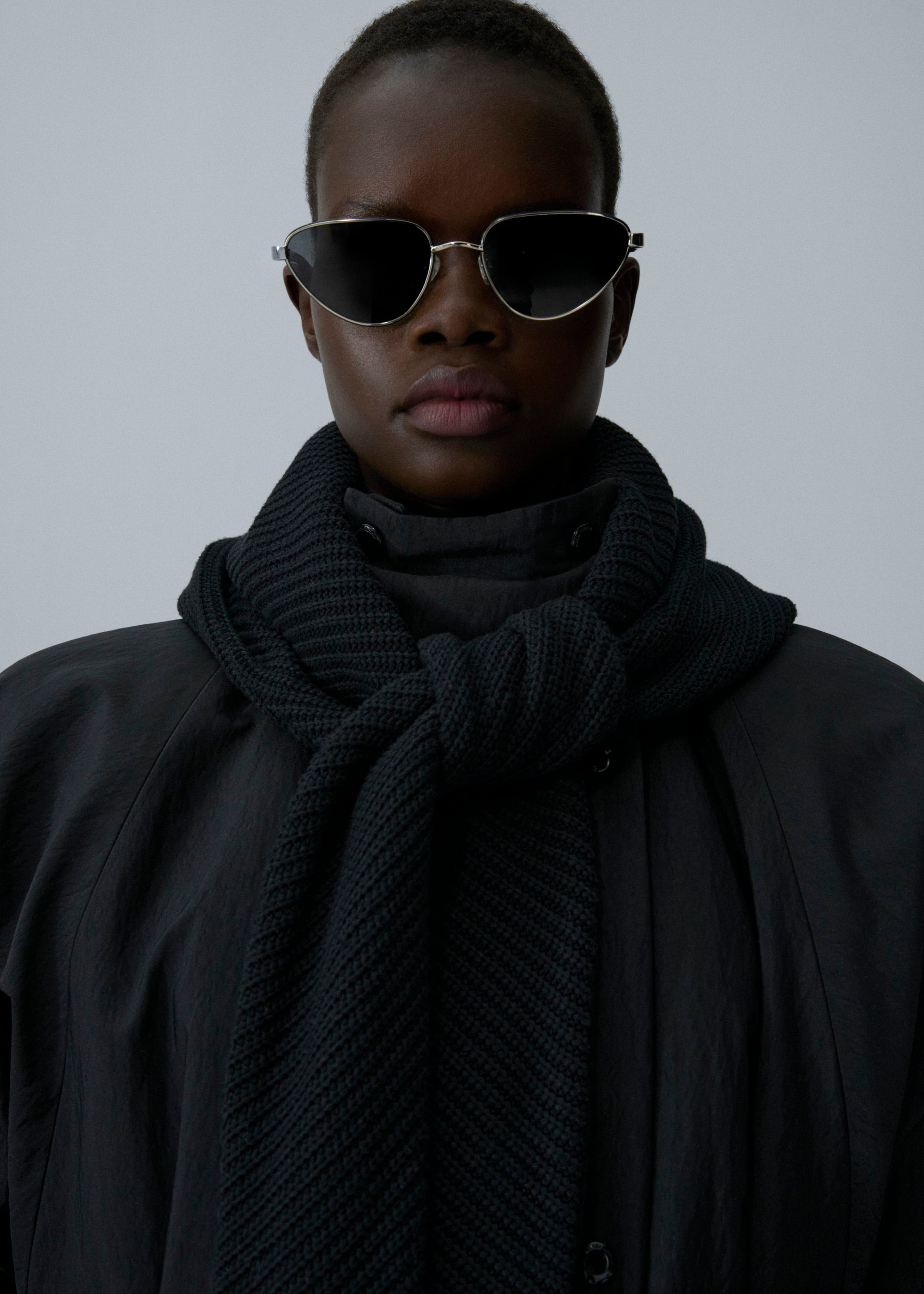 Knit hood long puffer coat in black - 4