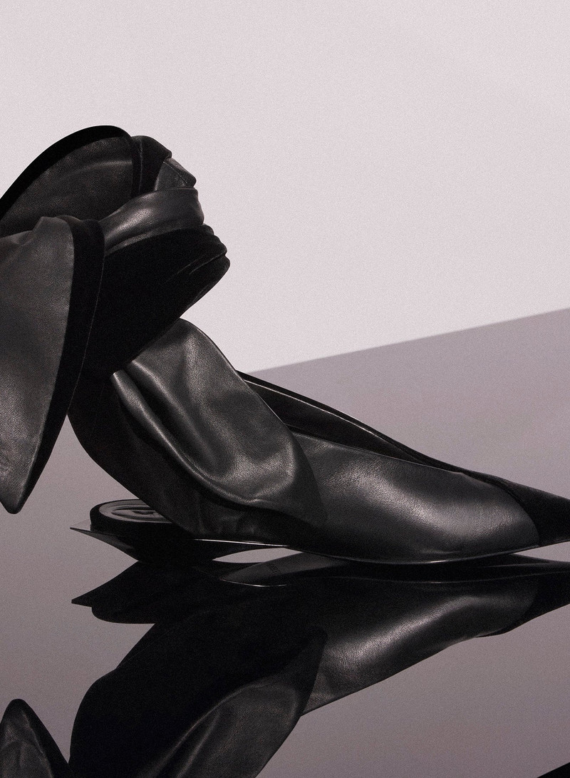 black leather knot fang flat mules 1