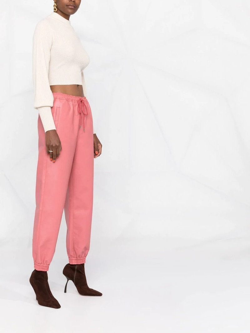 faux-leather tapered trousers 4